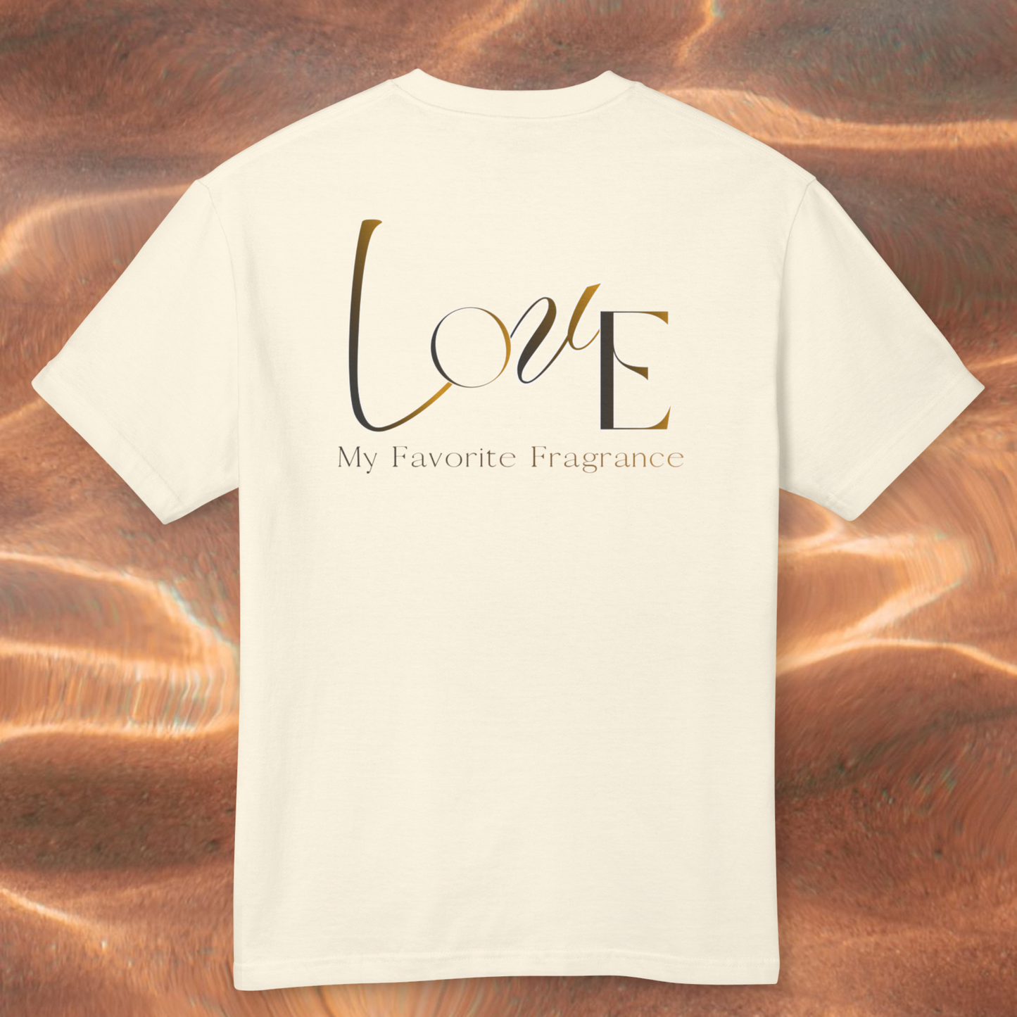 white 100% cotton shirt on a ethereal brown background the t-shirt graphic saying ' Love My favorite Fragrance' in brown dark color , spiritually designed clothing brand innovative concept into fashion spiritual , high vibrational clothing line