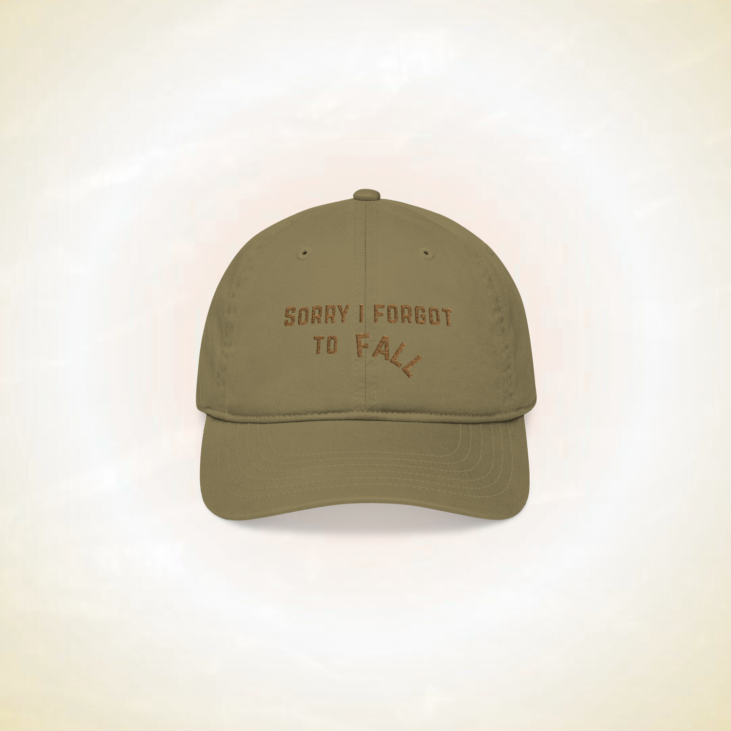 baseball cap to protect crown chakra gainst spiritual attacks, negative interference, negative energies, mental fatigue, it's a brown jungle color cap in organic cotton presented on a white background with the statement 'sorry i forgot to fall' timeless fashion and high frequency accessories