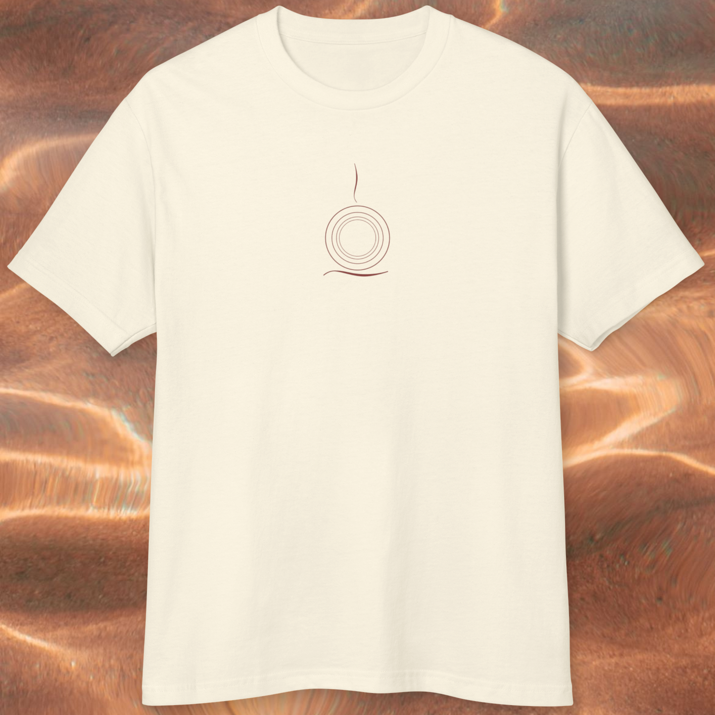 100% cotton white t-shirt unisex style with minimalist symbol round shape on the chest brown color spiritually designed tee high vibrational clothing fashion spiritual concept, the t-shirt is on a brown ethereal background lookalike water