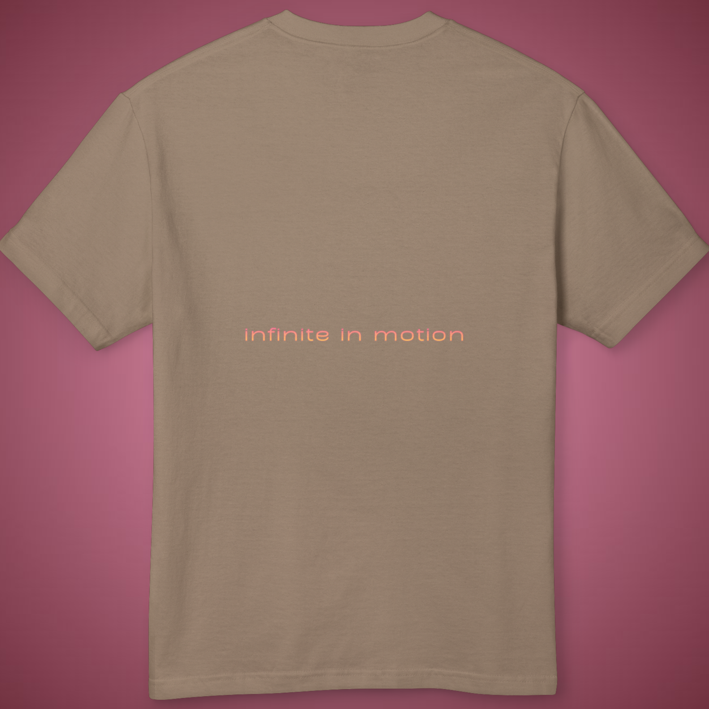 back view of a brown t-shirt unisex cut style with the printed saying " infinite in motion" in beige and pink minimalist 